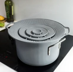 Grydelåg med overkogningssikring