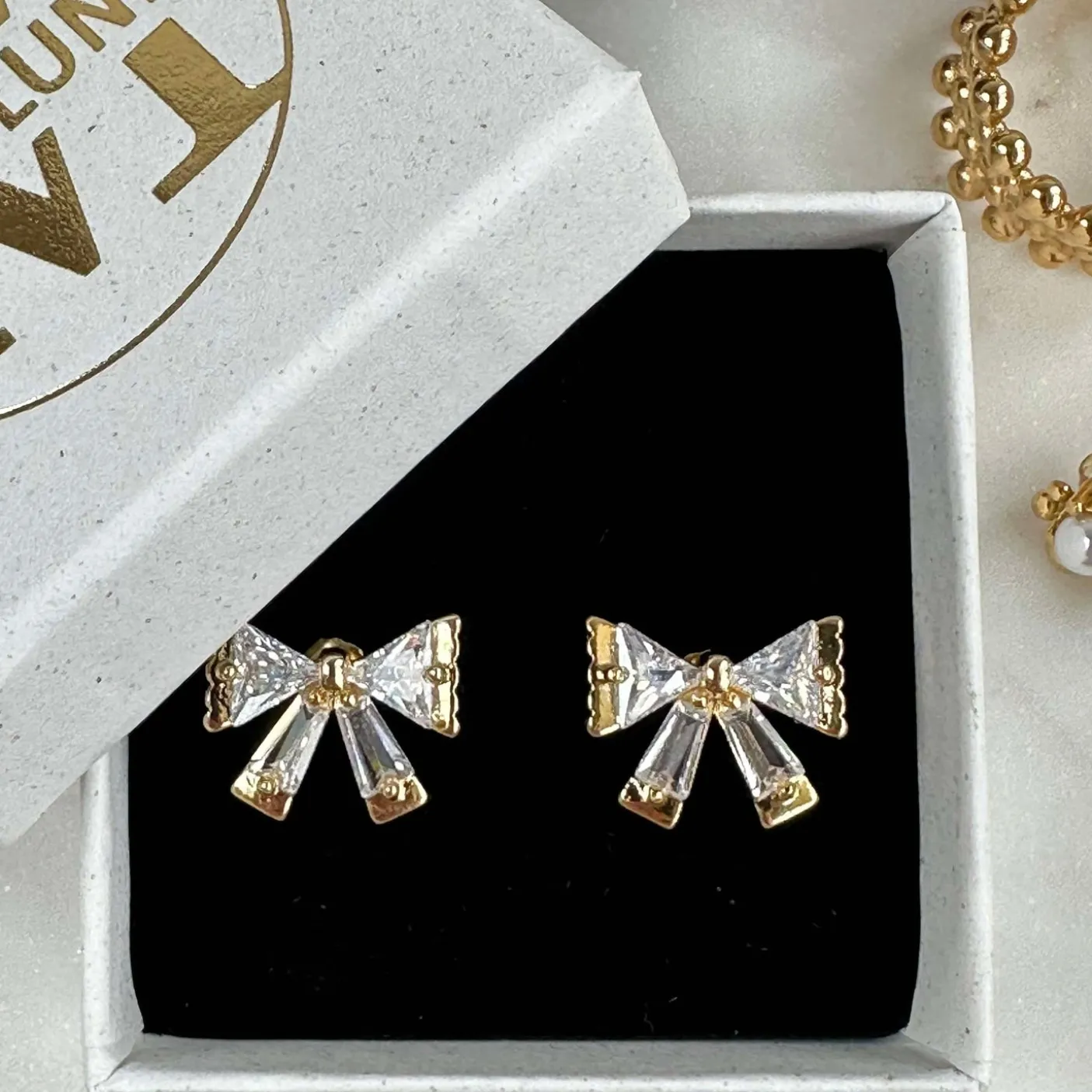 Øreringe ARIELLE m. Sløjfe og zirkoner