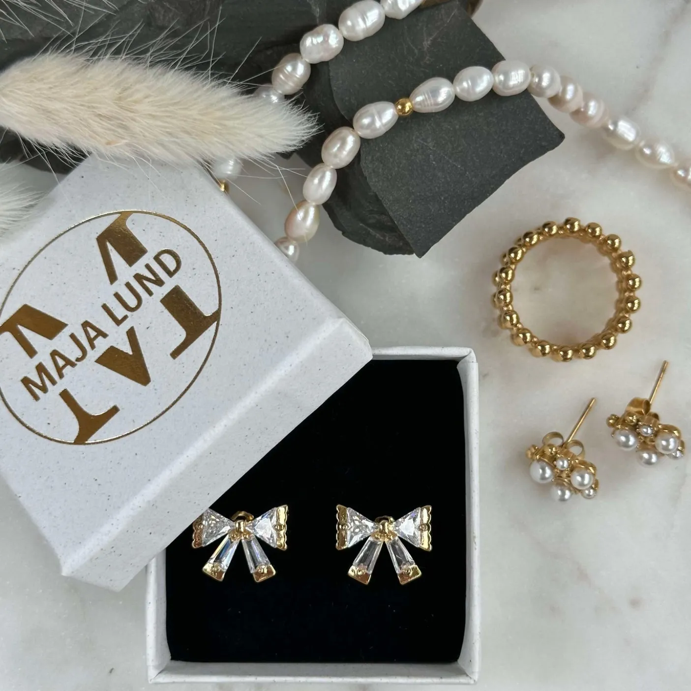 Øreringe ARIELLE m. Sløjfe og zirkoner